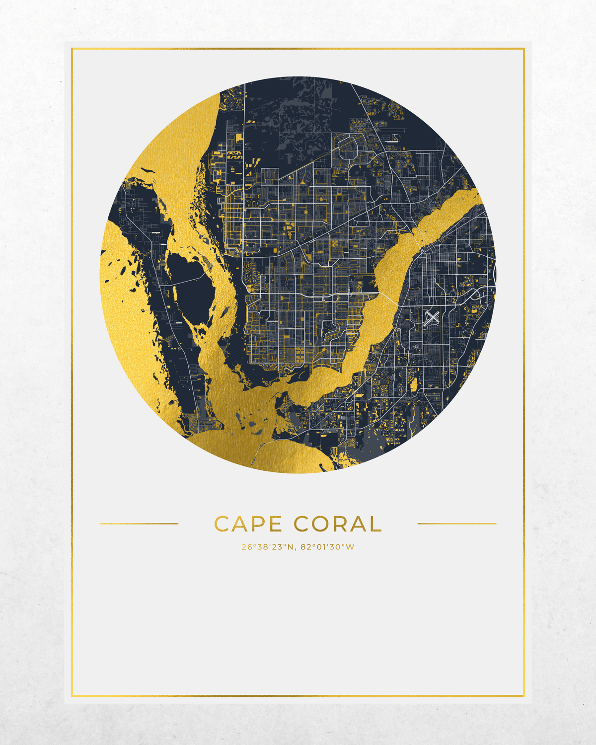 A minimalist circular map print of Cape Coral, Florida, featuring a navy blue and gold design with coordinates and location text below, presented on a light textured background.