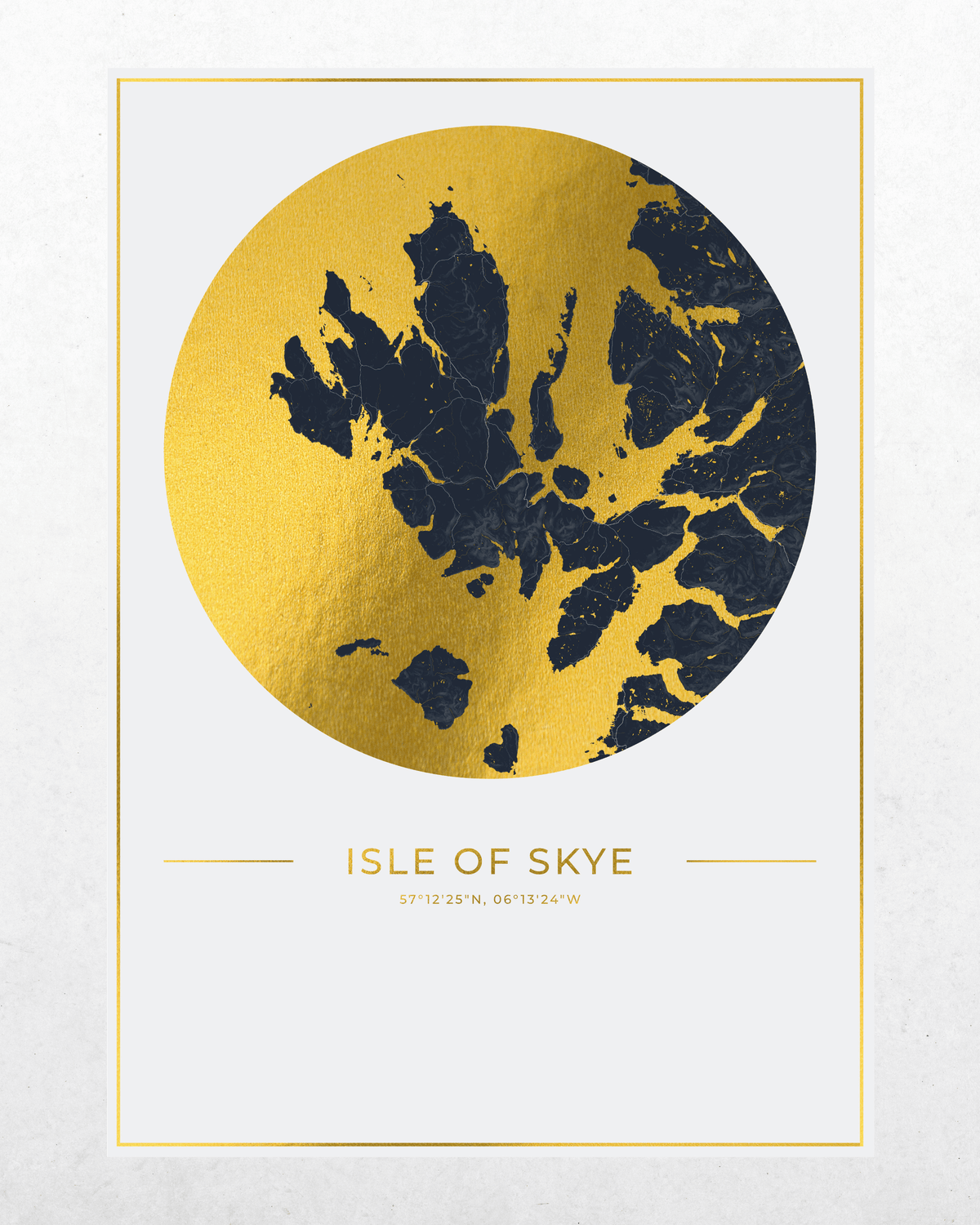 A minimalist art print featuring a stylized map of the Isle of Skye in dark navy blue within a large textured gold circle, framed by a thin gold border on a white background with coordinates printed below.