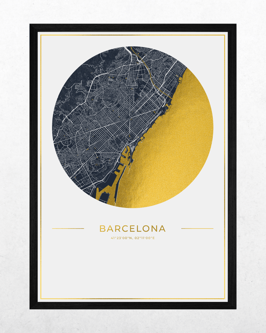 A framed minimalist map print of Barcelona, featuring a circular city layout in dark navy and metallic gold with the city name and coordinates printed below, set against a light textured background.