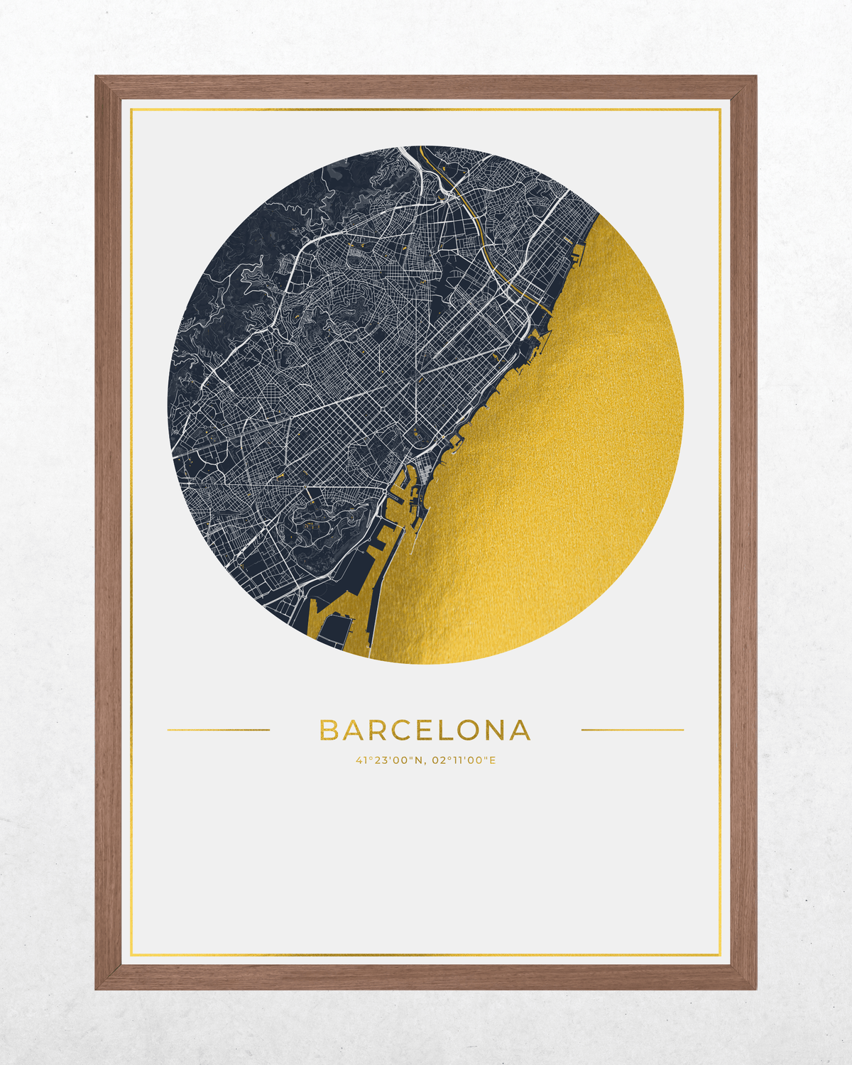 Framed Barcelona city map wall art print with a circular graphic in navy and gold, shown in a brown wood frame against a light textured wall.