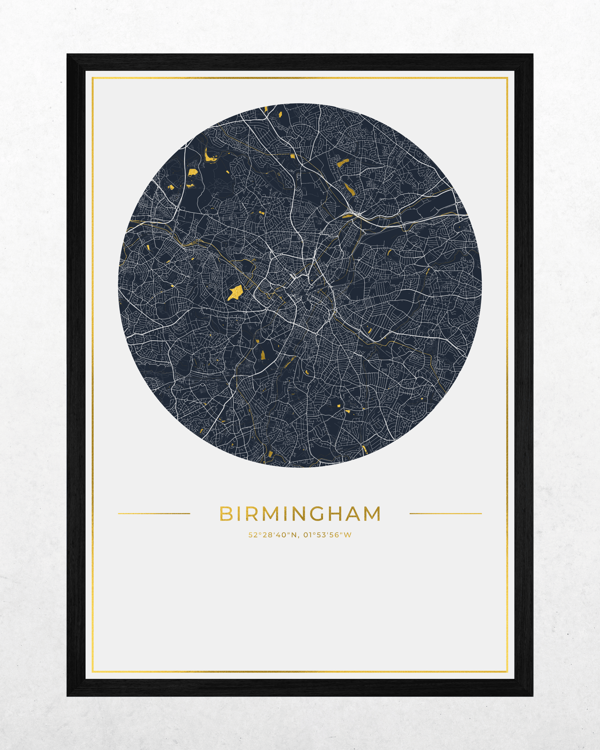 A framed circular map print of Birmingham, UK, featuring a dark navy blue map with white road lines and small gold highlights, set against a light gray background with a black frame and gold inner border.