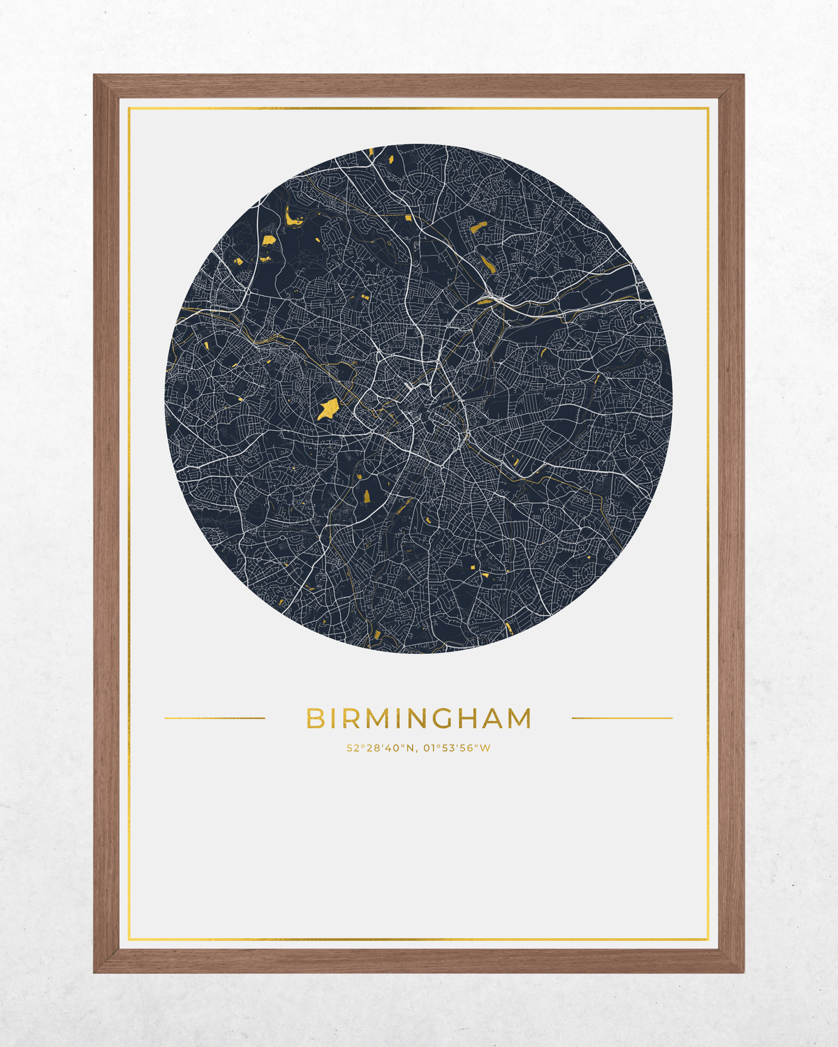 A framed city map print of Birmingham, UK, featuring a dark navy blue circular map with white road lines and small gold highlights, set against a light cream background with a brown wood frame.