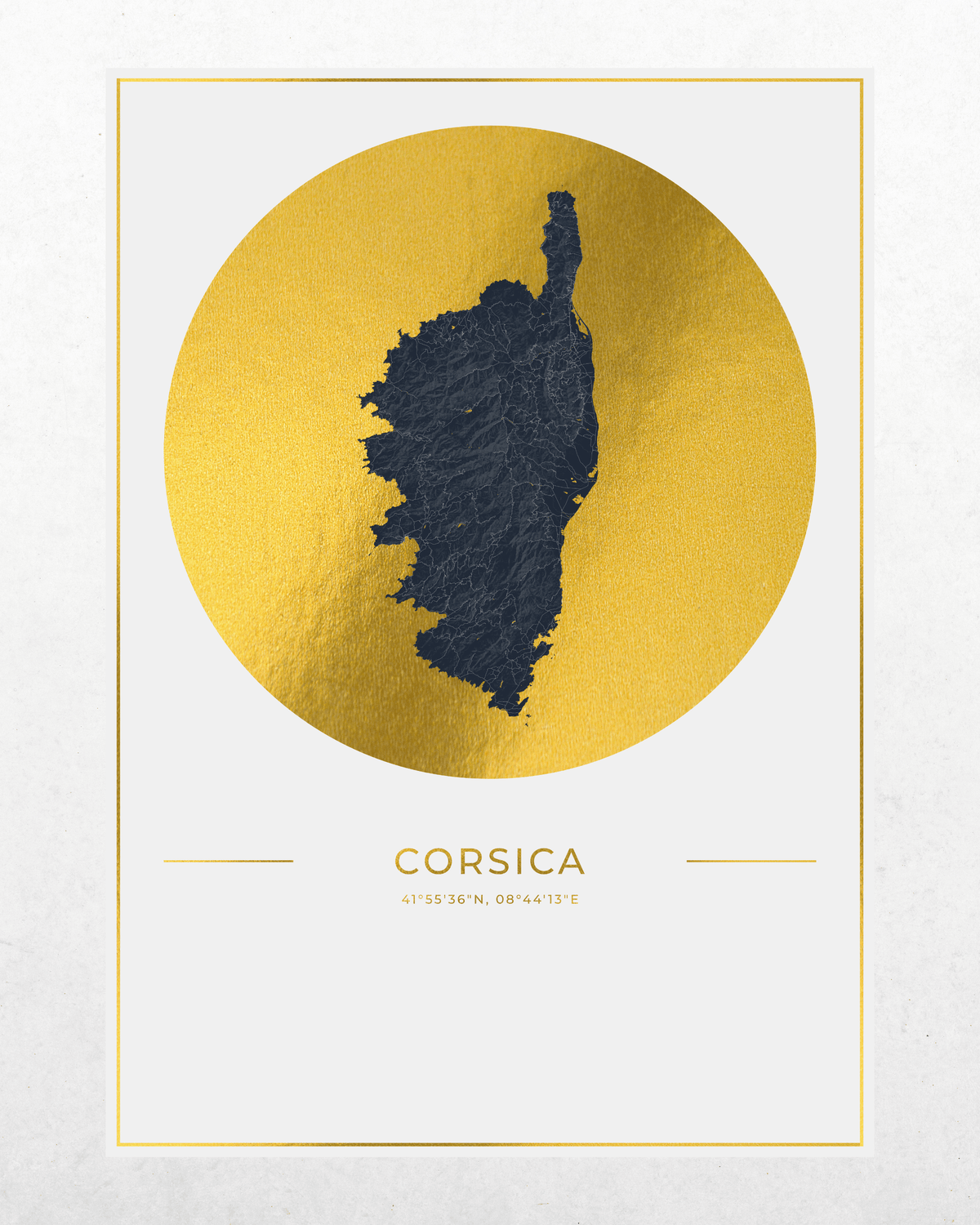 A minimalist art print featuring a textured dark blue map of Corsica centered within a large gold circle on a white background, with the word 'CORSICA' and coordinates printed below.