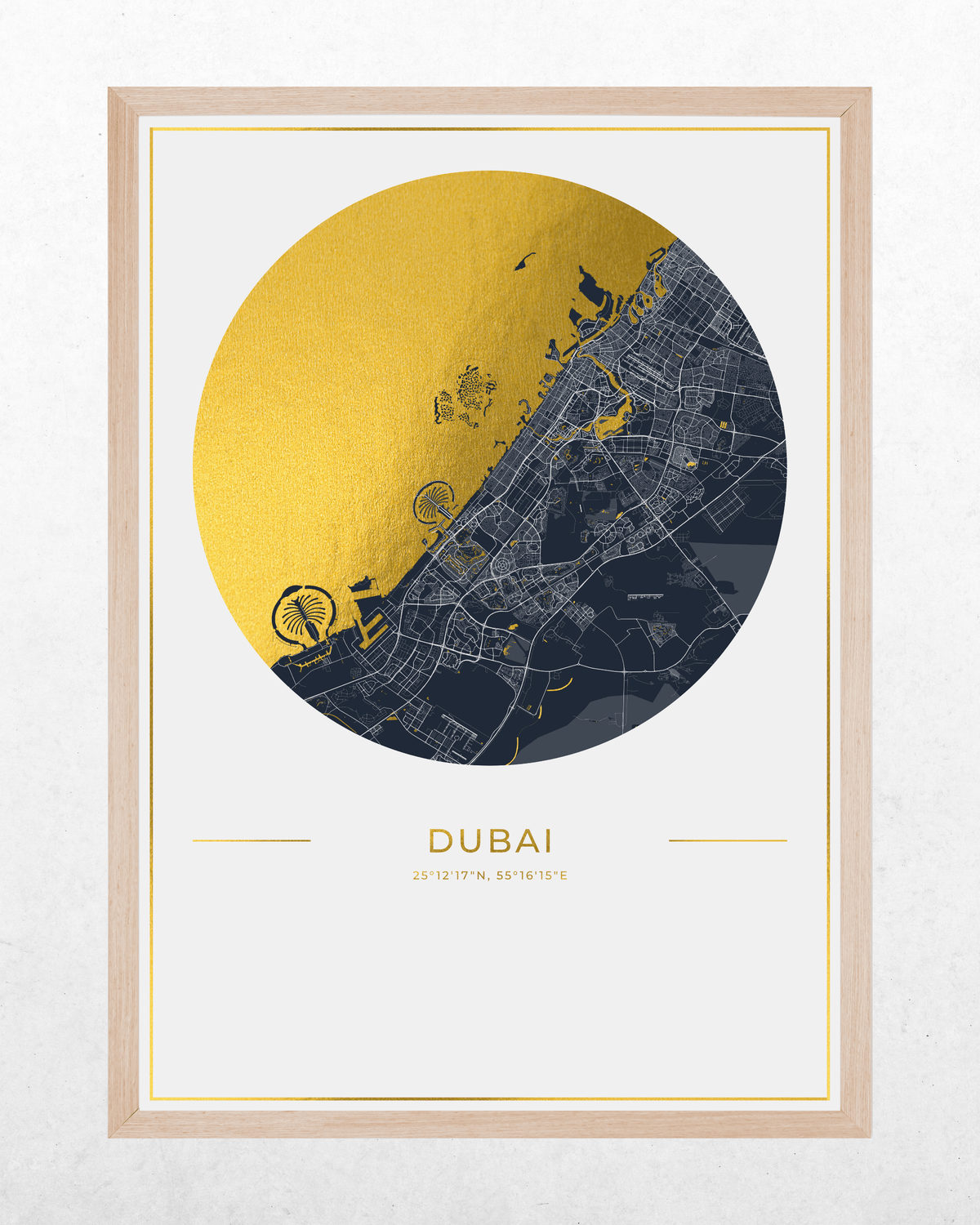 Framed Dubai city map wall art featuring a large circular design with a gold foil-textured left half and a dark navy street-map right half, with the word DUBAI and coordinates below, shown in a light wood frame against a light wall.