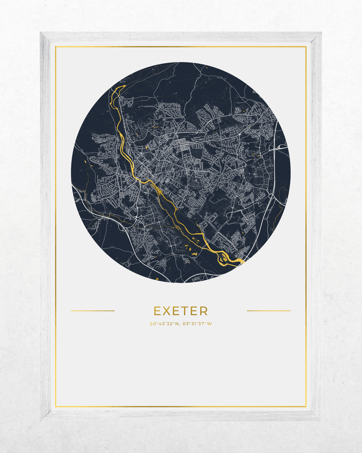 A framed circular city map print of Exeter, featuring a dark navy blue map with white street lines and a highlighted gold river running through the center, set against a light off-white background with gold text and a white frame.