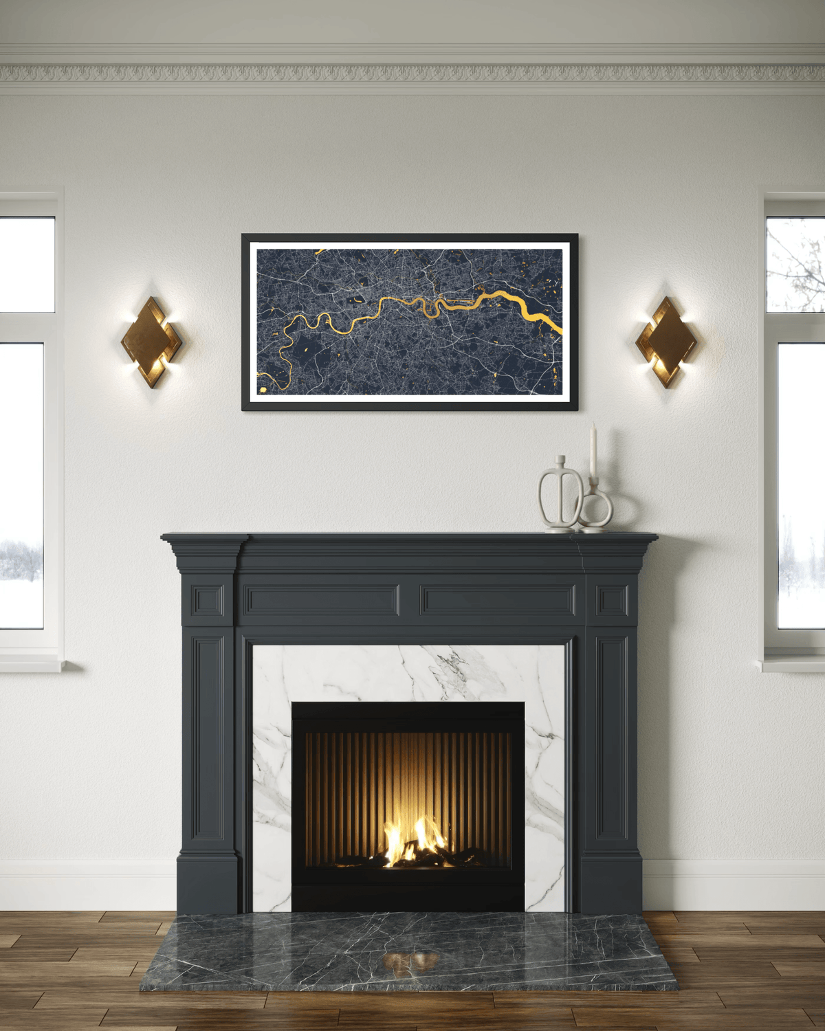 A framed map art print of London with a gold river line on a dark blue background, displayed in a black frame above a dark charcoal fireplace mantel in a modern room setting.