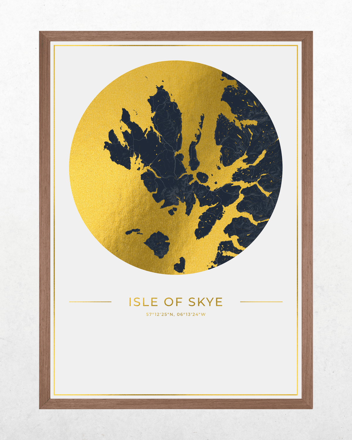 Framed wall art print featuring a circular gold map design with dark navy landmasses and the text 'ISLE OF SKYE' below, shown in a brown wood frame against a light textured wall.