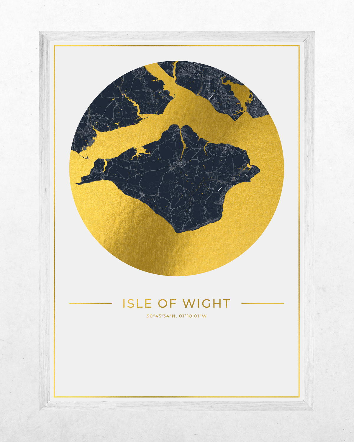 A framed art print featuring a stylized map of the Isle of Wight, with a dark navy blue landmass and water inside a large metallic gold circle, on a white background with gold text reading 'ISLE OF WIGHT'.