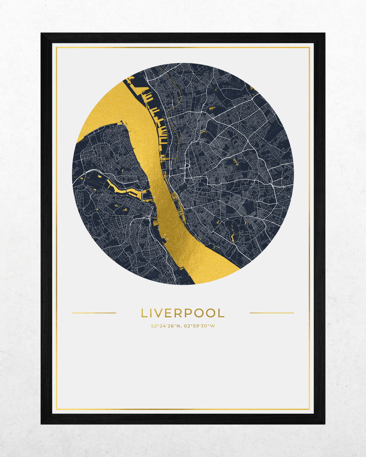 A framed circular map print of Liverpool, featuring a dark navy street grid with a bold metallic gold river cutting through the center, plus gold text reading 'LIVERPOOL' and coordinates below. The print is set within a white frame against a light textured background.