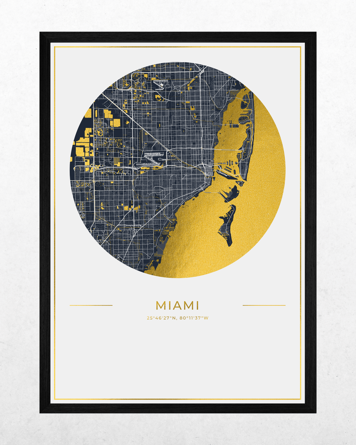 A framed Miami city map art print featuring a circular map design with dark blue streets and a gold coastline, displayed on a light textured background.