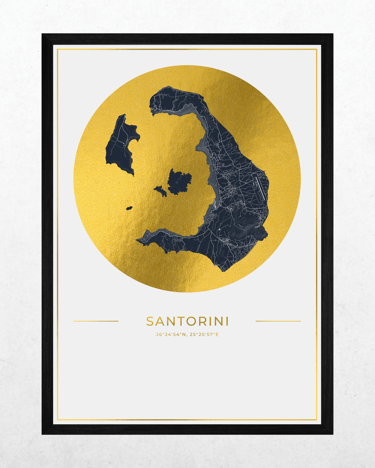 Framed minimalist map art print of Santorini, Greece, featuring a dark navy blue silhouette of the island over a textured gold circular background, with the text 'SANTORINI' and coordinates below, set in a black frame against a light gray wall.