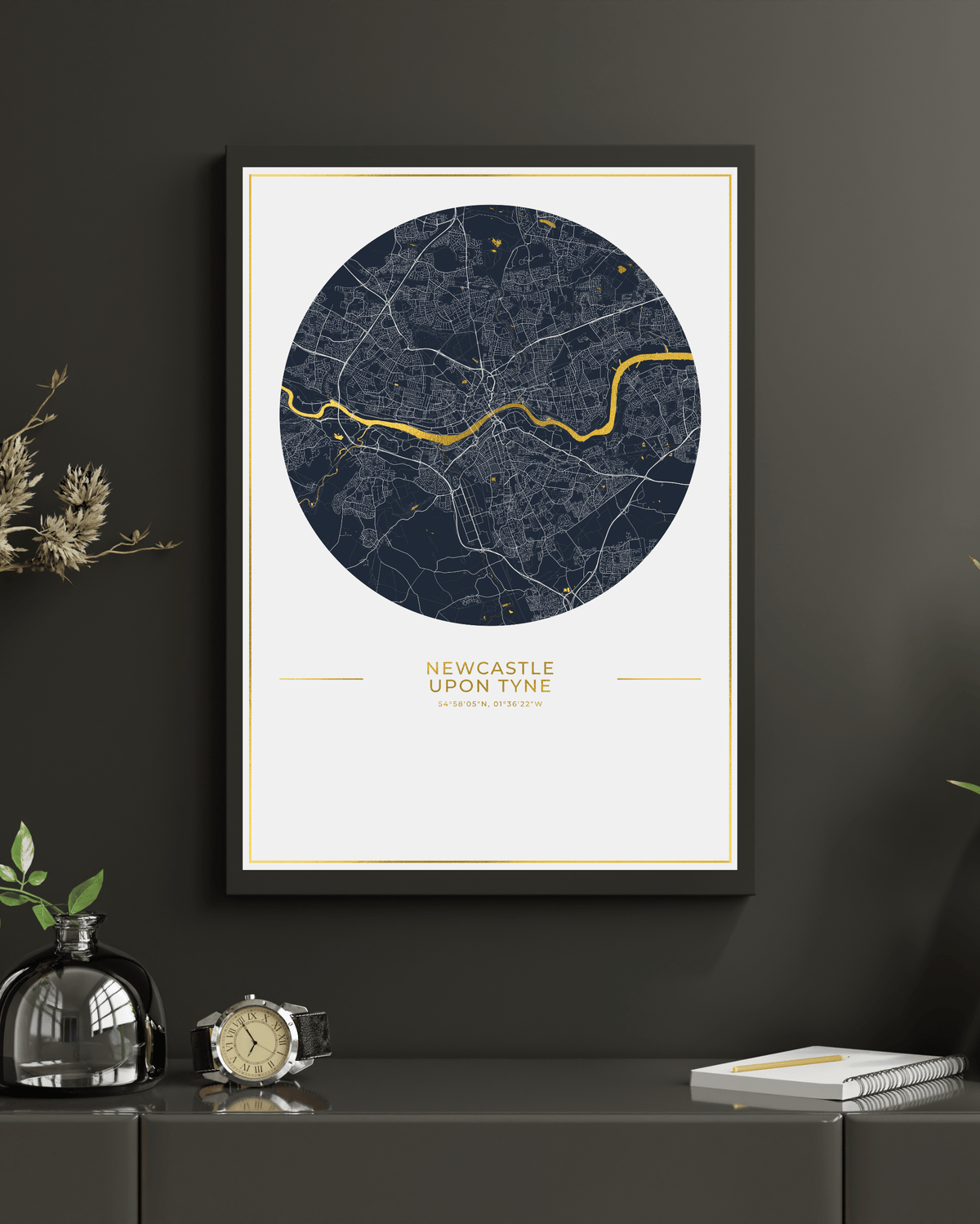 Newcastle upon Tyne gold foil map in a black frame.