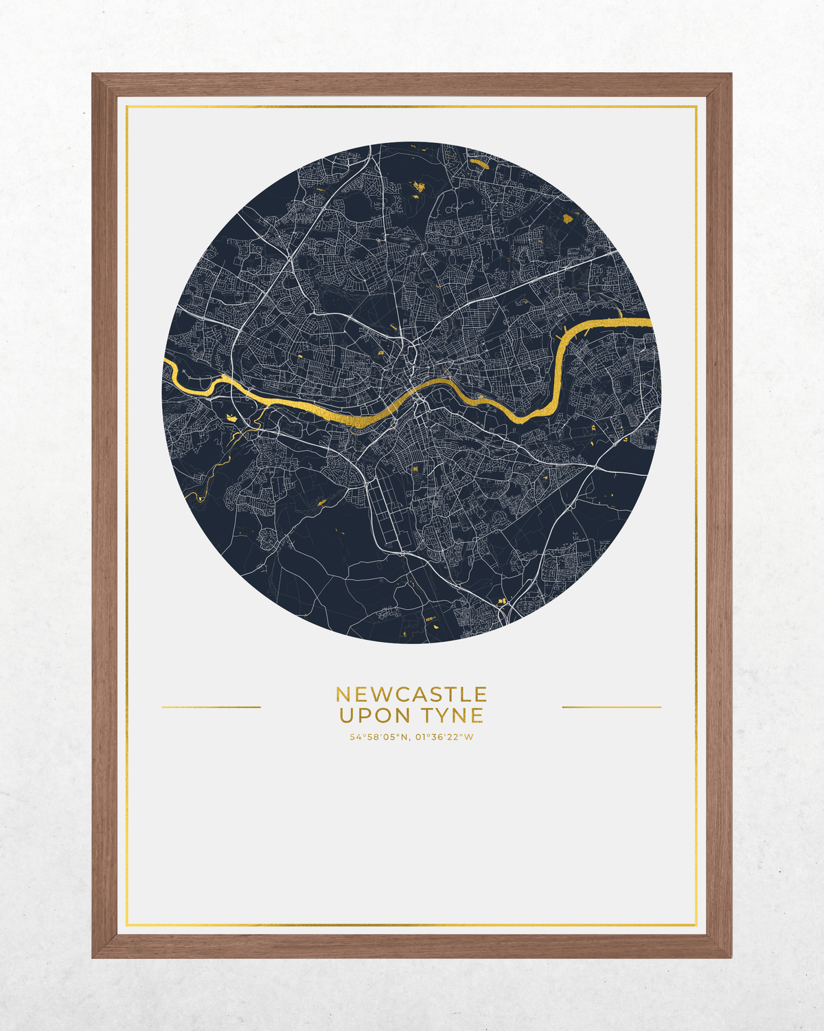 Newcastle upon Tyne gold foil map in a dark wood frame.