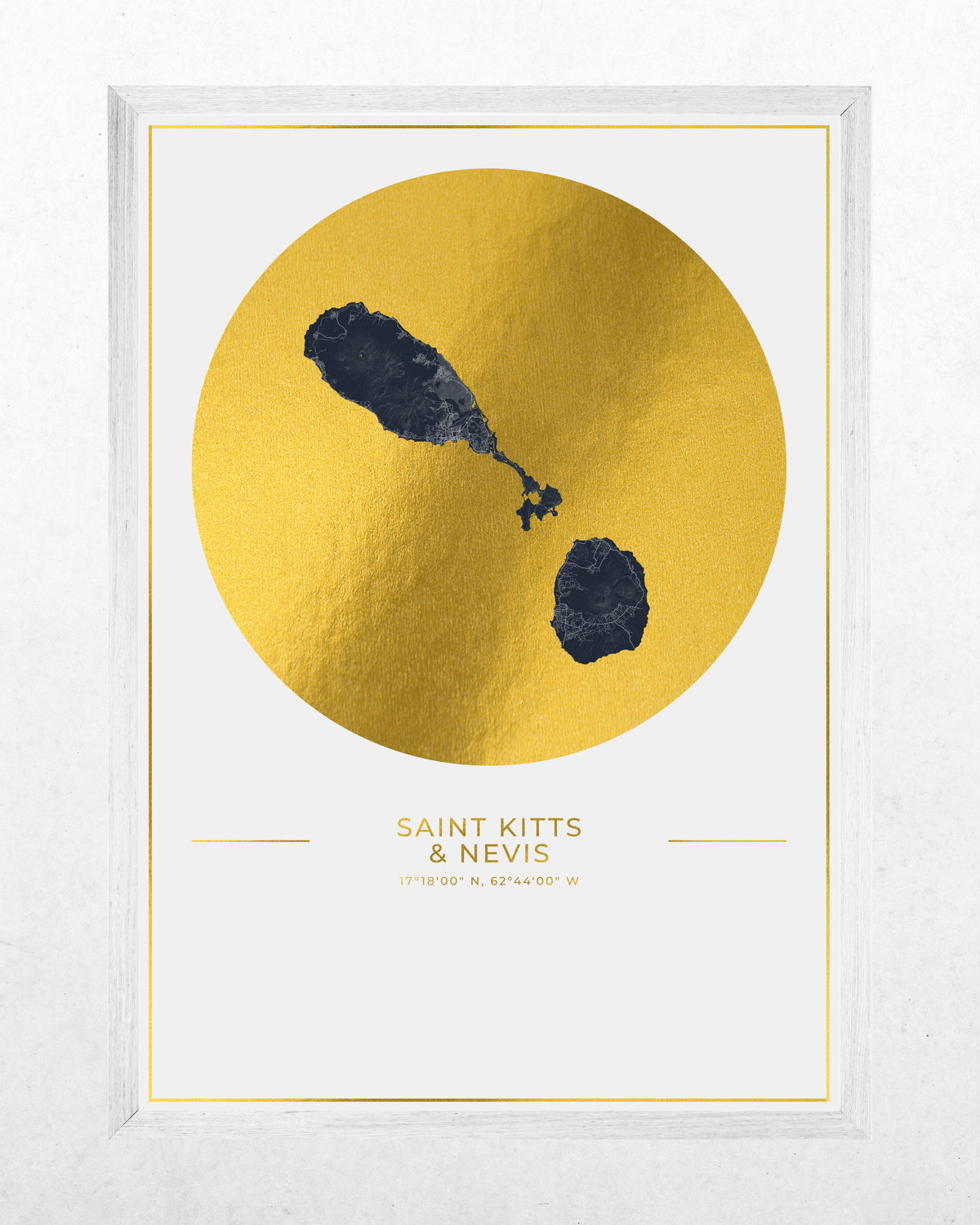A framed minimalist art print featuring a large textured gold circle on a white background with a map of Saint Kitts & Nevis and the text 'SAINT KITTS & NEVIS' below.