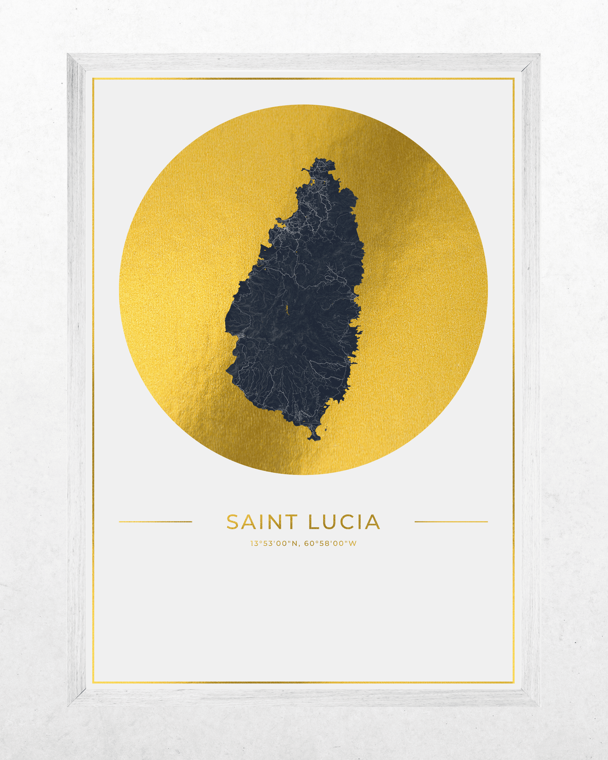 A framed Saint Lucia map art print featuring a dark navy blue silhouette of the island on a textured gold circular background, with 'SAINT LUCIA' and coordinates printed below, set in a white frame against a light gray wall.