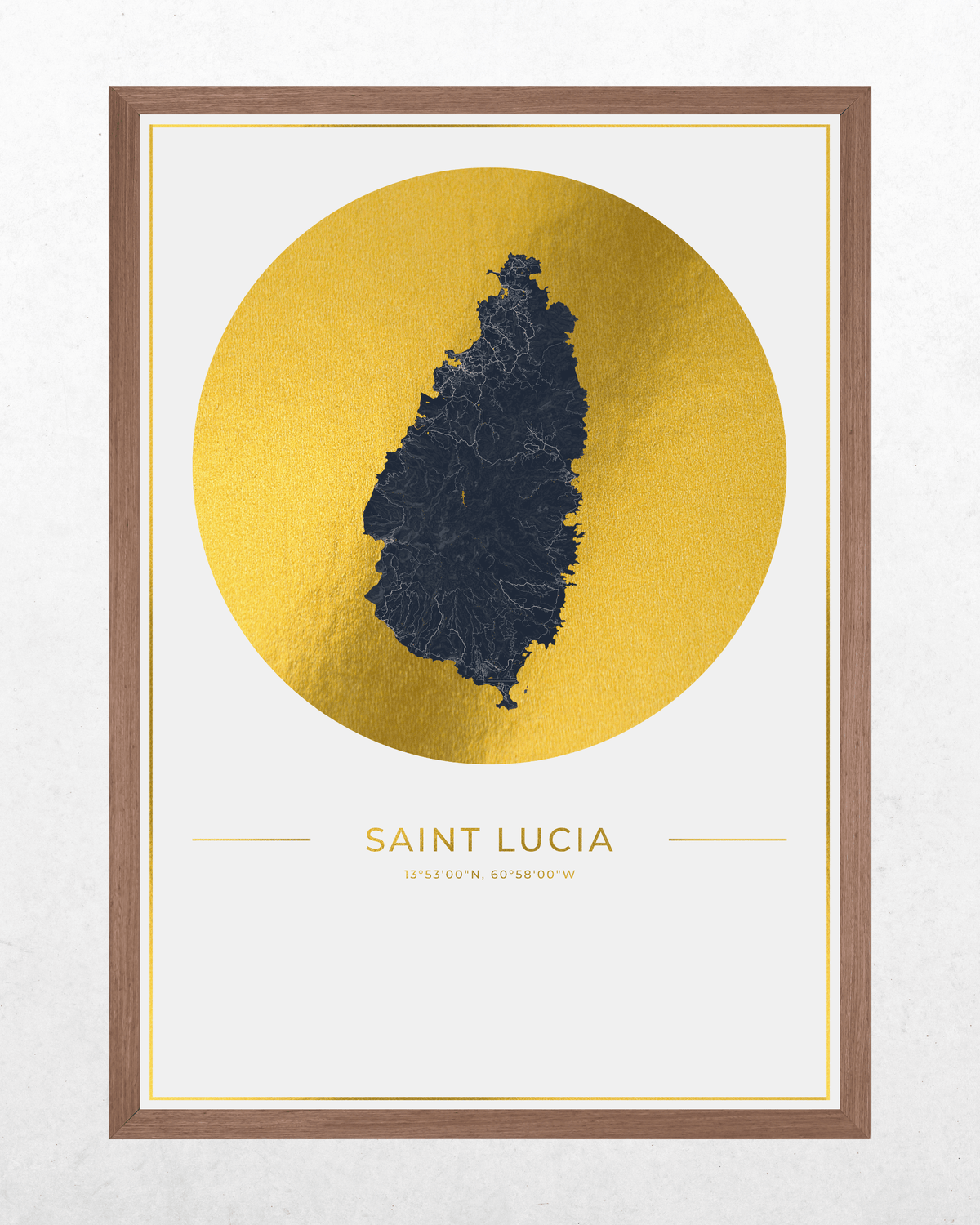 Framed Saint Lucia map art print featuring a dark navy silhouette of the island centered within a large textured gold circle, with 'SAINT LUCIA' and coordinates printed below on a white field, enclosed in a brown wood frame.