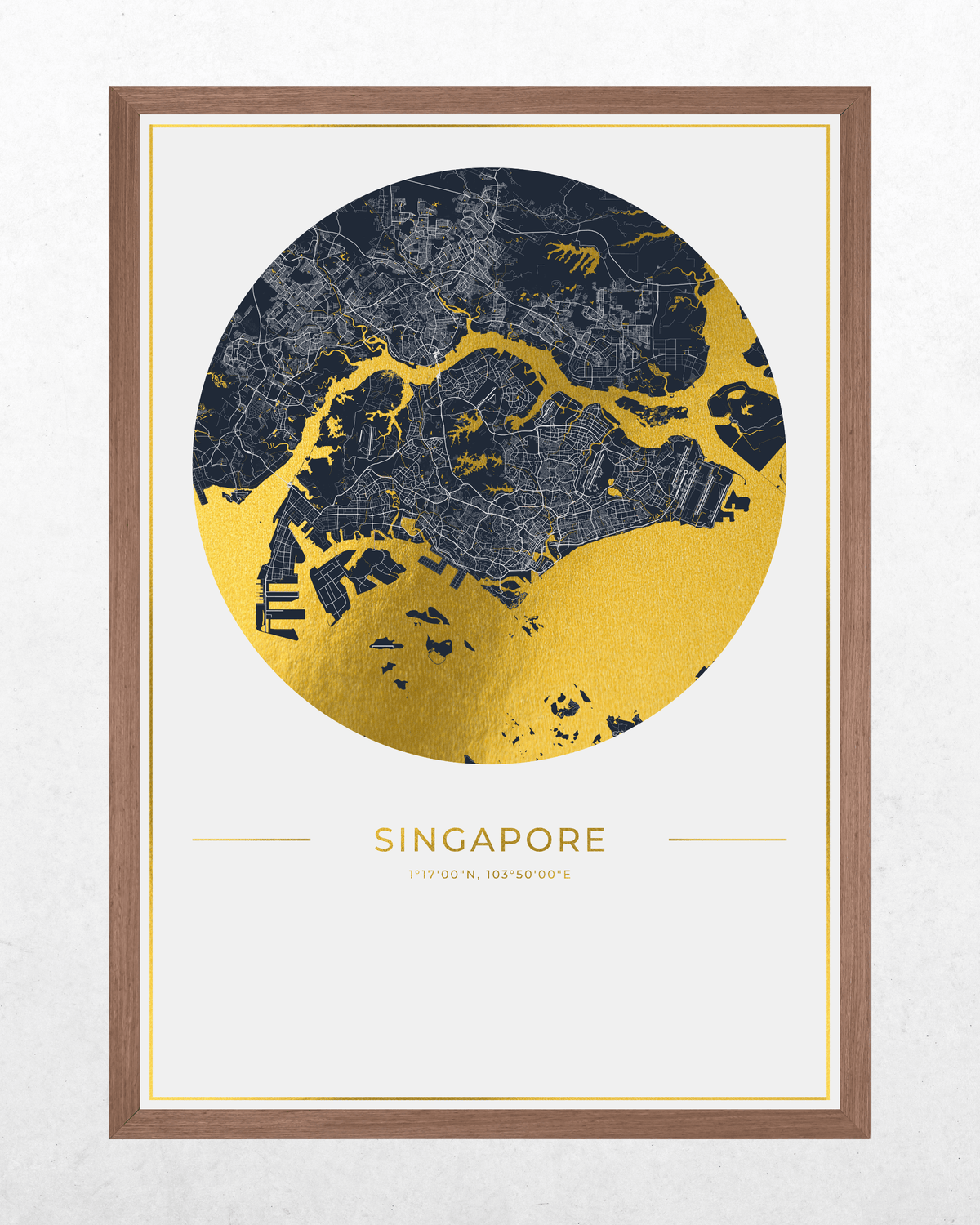 Framed Singapore map art print featuring a circular design with dark navy land and metallic gold water, displayed in a light brown wood frame against a textured white wall.